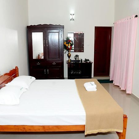 Greenfield Inn Thiruvananthapuram Phòng bức ảnh